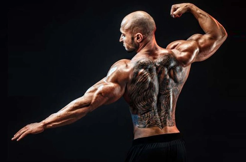 bodybuilder with back tatoo